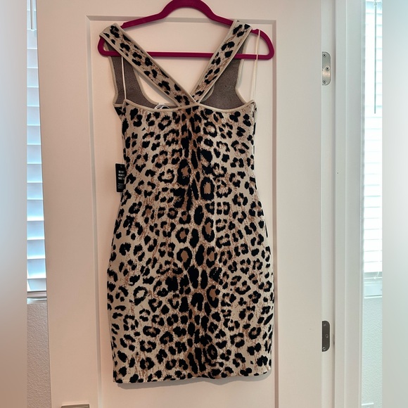 Express LIMITED EDITION BODY CONTOUR LEOPARD PRINT MINI SWEATER DRES - Picture 5 of 5